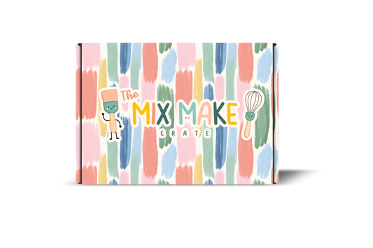 A rectangular product box for 'The Mix Make Crate' featuring a colorful pastel vertical brushstroke pattern in pink, blue, green, yellow, and orange on a white background, with a cartoon character and whisk illustration on the front.